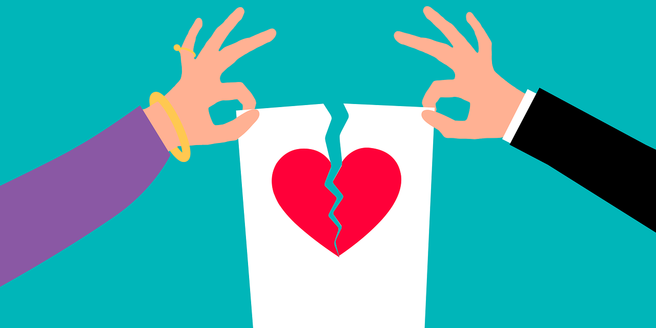 divorce-6905533_1280 Dos personas rompiendo un papel con un corazón